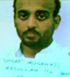 Ramzi Bin al-Shibh shortly after arrest. The name shown under his face is one of his aliases. (Note: this picture is from a video presentation on prisoners the Pakistani government gave to BBC filmmakers. It has been adjusted to remove some blue tinge.)